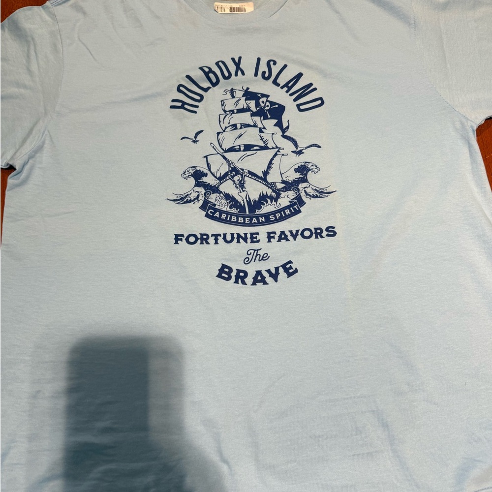 Holbox island shirt. Purchased there and never put on! It’s too small.